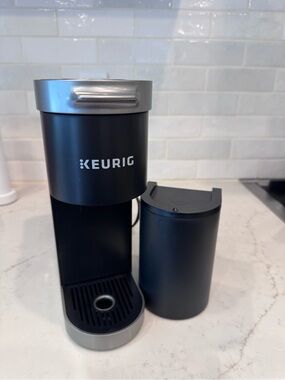 Keurig mini plus Single-Serve Coffee Maker in Black and Silver.
